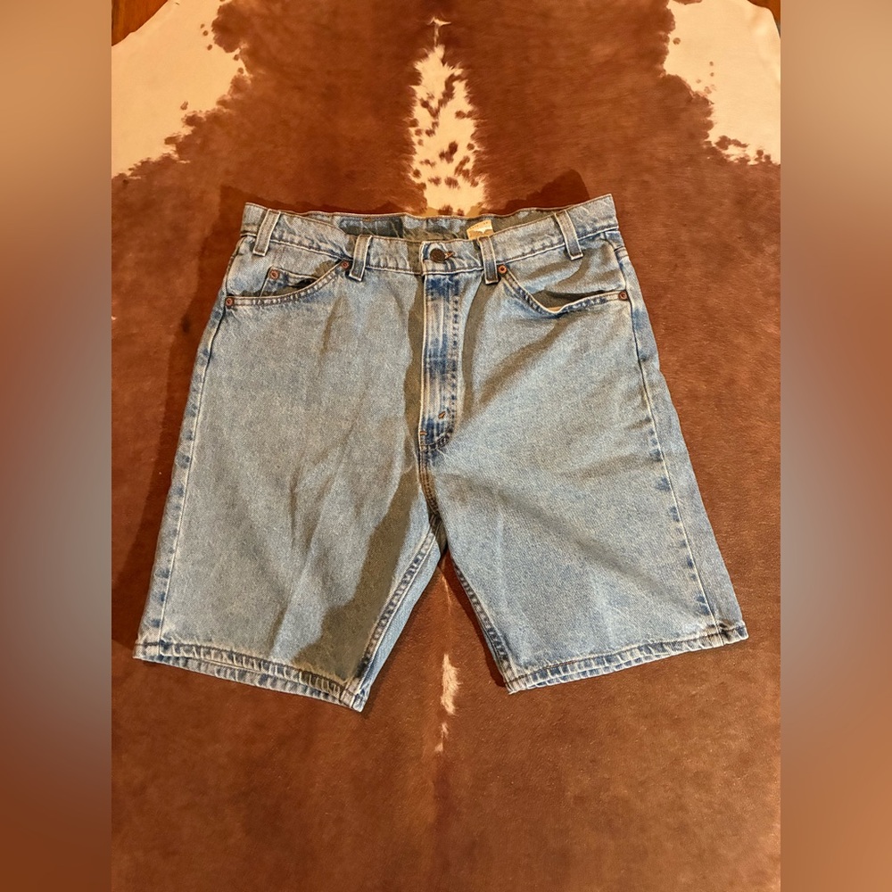 Vintage Orange Tab Levi's shorts 
tagged a size 36 length 9